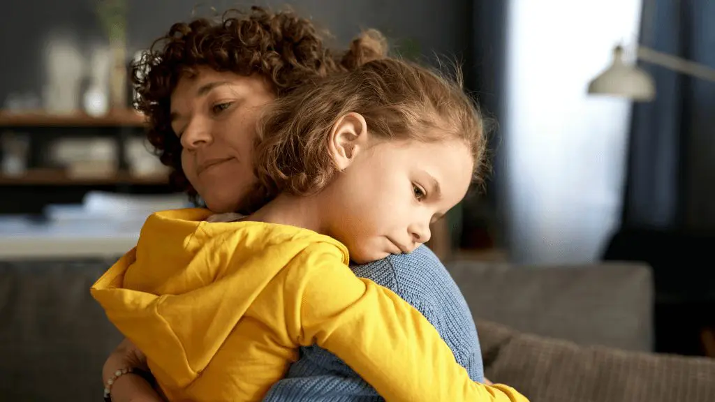 Child hugging their mother, offering comfort and support during a moment of big emotions, reflecting the theme of helping kids handle and express their feelings.