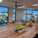 Buttercups Perth Childcare North Perth nursery room featuring a bright, engaging space with large windows, age-appropriate toys, soft play equipment, and cosy reading corners for infants.