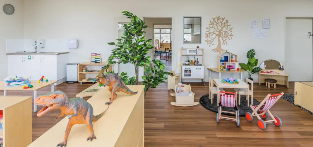 Indoor learning and play area at a Perth childcare centre, featuring creative play stations, educational toys, and a welcoming environment for children.