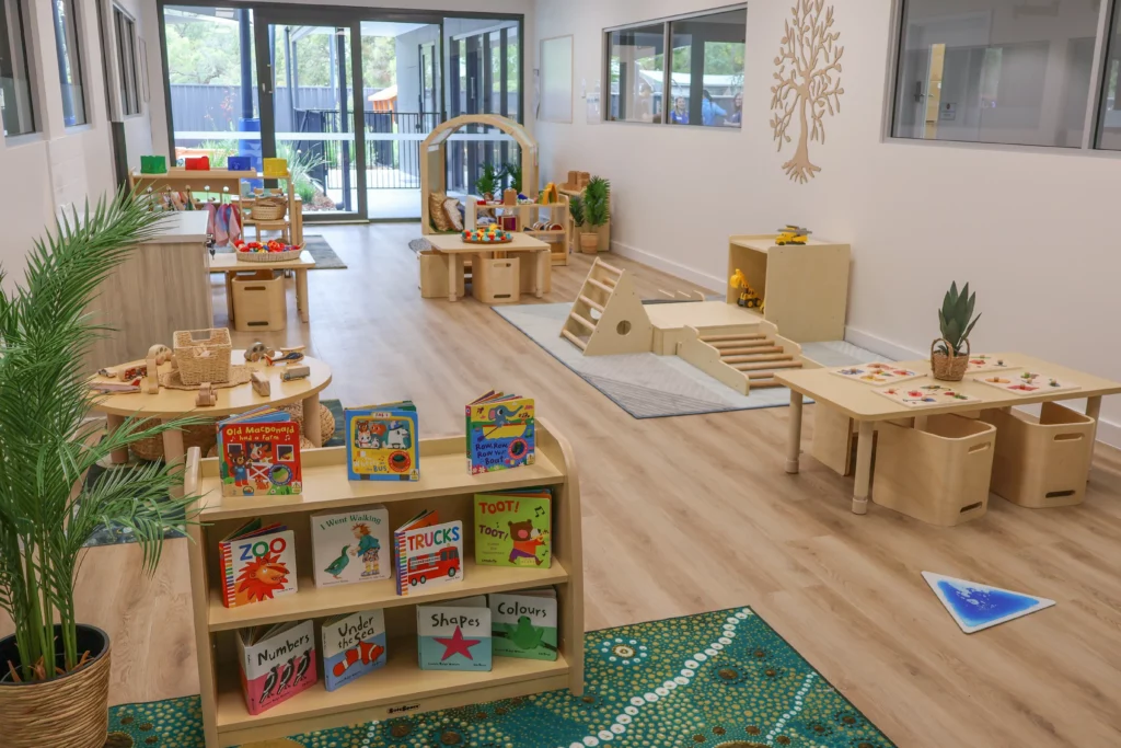 Engaging indoor play space at Buttercups Perth Childcare, featuring cosy reading nooks, sensory play stations, and interactive learning areas designed to foster creativity, exploration, and social development in a warm and inviting environment.