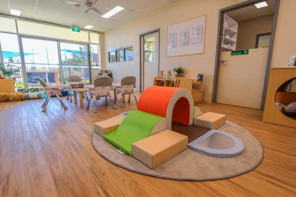 Buttercups Perth Childcare Mandogalup nursery room featuring a bright, engaging space with large windows, age-appropriate toys, soft play equipment.