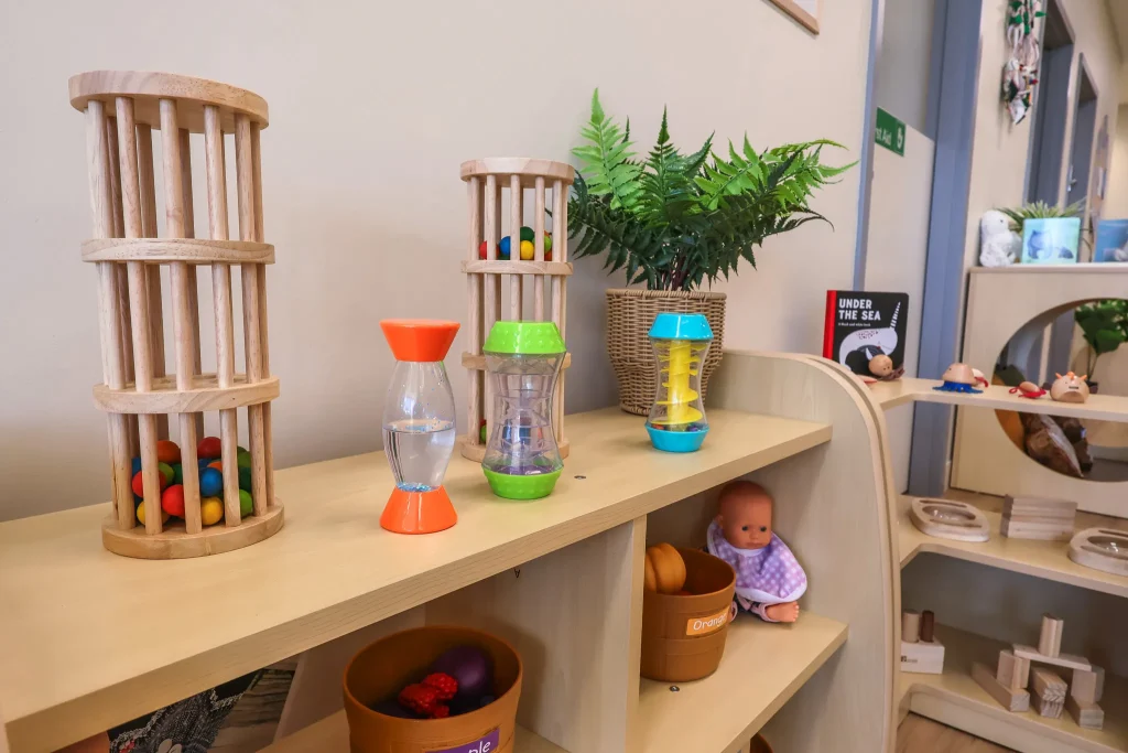 A learning shelf at Buttercups Perth Childcare displays colourful, age-appropriate toys within easy reach. This low-level shelf is designed to encourage hands-on exploration and independent play for the littlest learners.