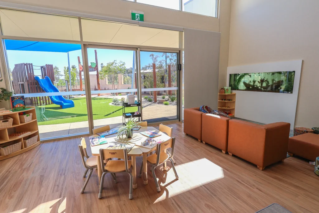 Step inside our Buttercups Perth Childcare centre, where every detail is designed to inspire learning through play. A large built-in aquarium at Buttercups Childcare features colourful fish, a sunken ship decoration, and aquatic plants. The engaging underwater scene adds a calming and interactive element for children.
