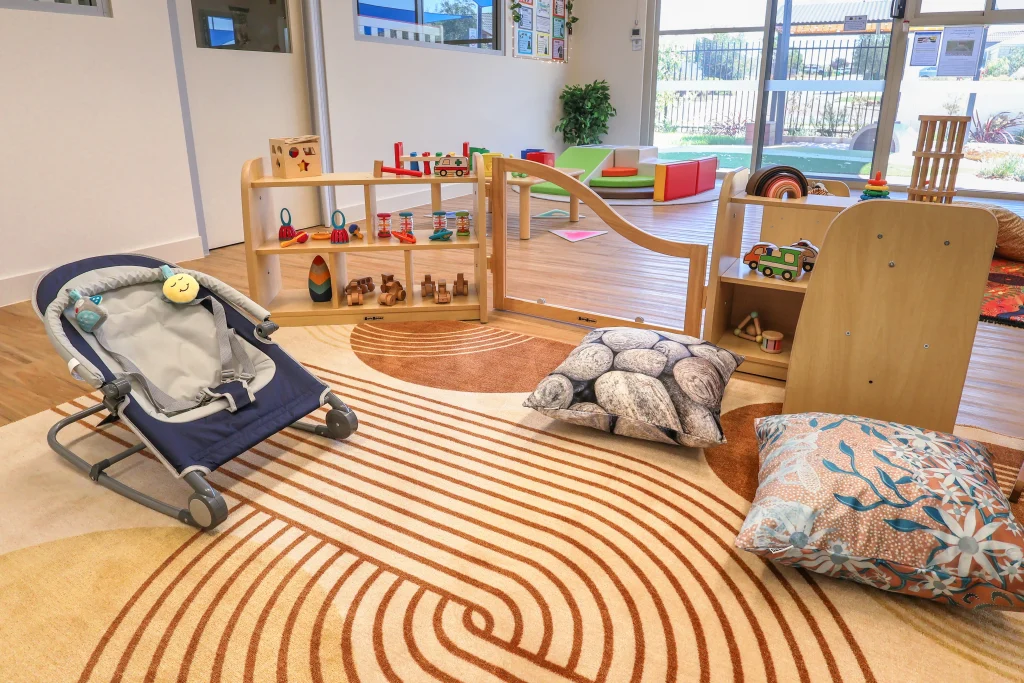 Buttercups Perth Childcare North Perth nursery room featuring a bright, engaging space with large windows, age-appropriate toys, soft play equipment, and cosy reading corners for infants.